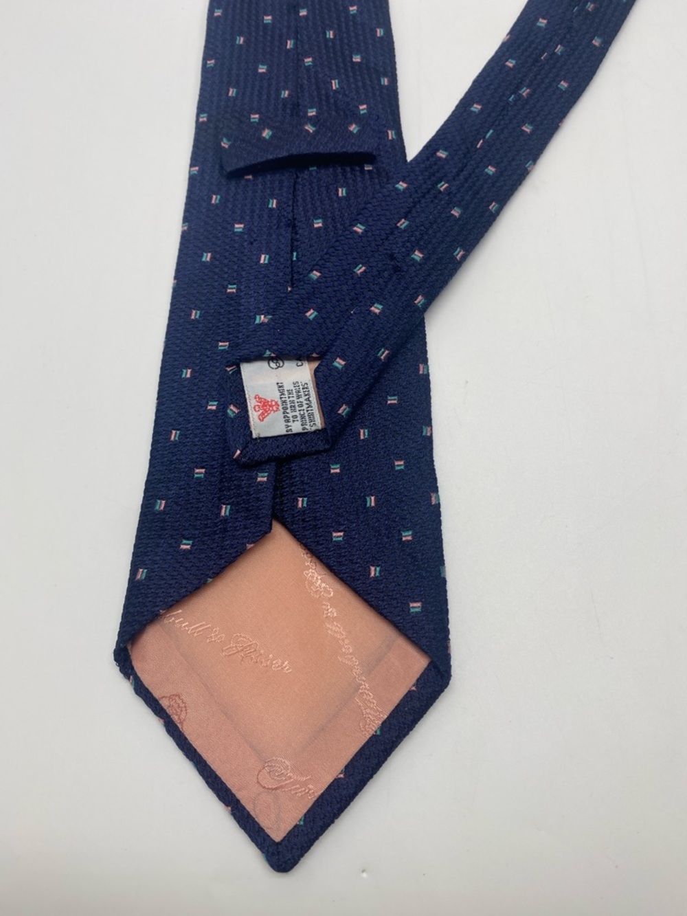 Navy blue geometric handmade tie from the luxury British brand Turnbull & Asser